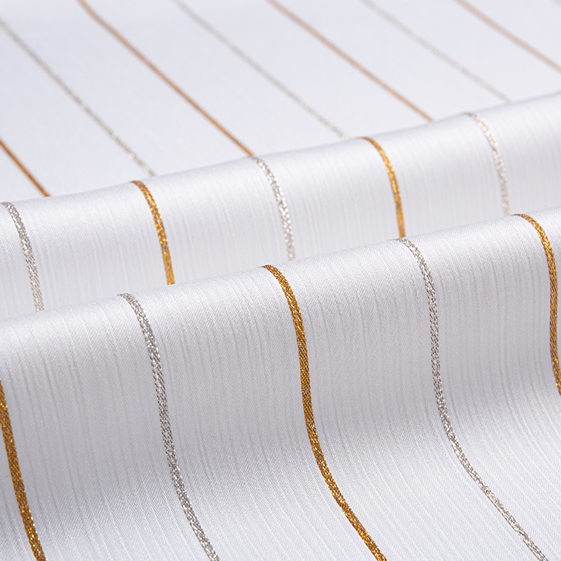 Satin crepe guld stribet stof