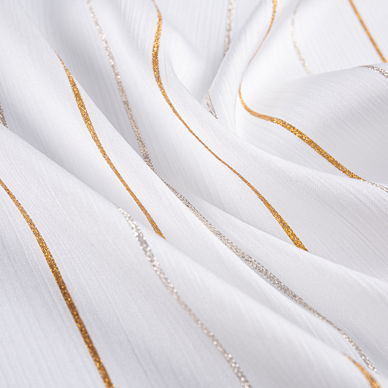 Satin crepe guld stribet stof