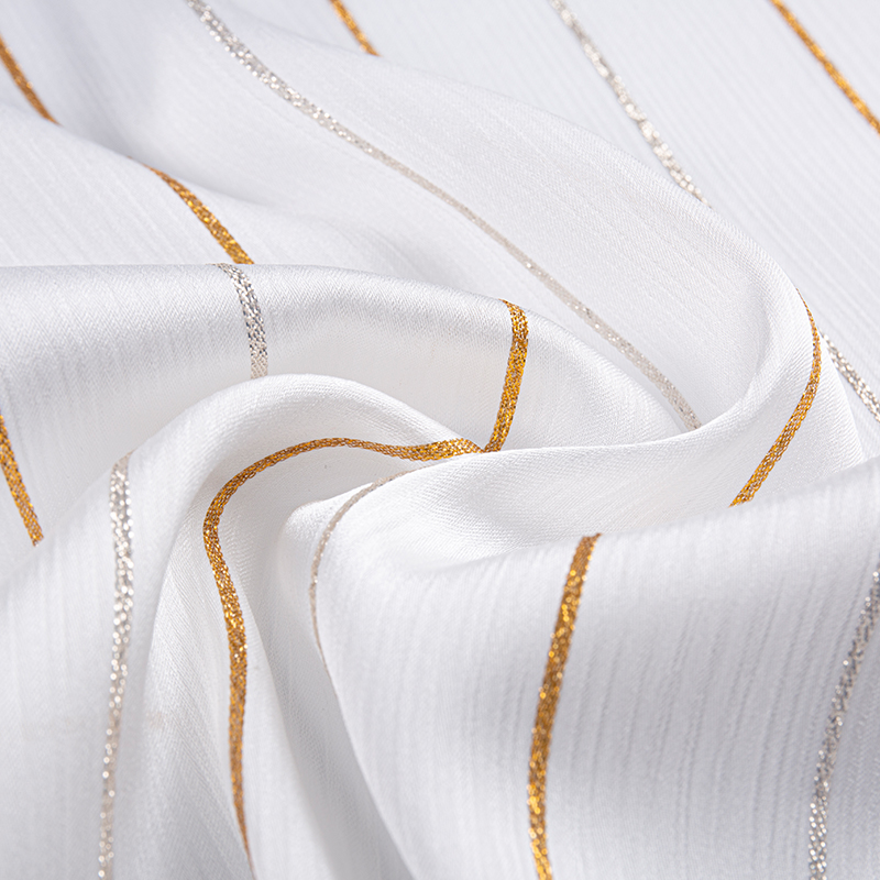 Satin crepe guld stribet stof