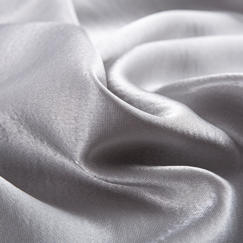 Forgyldt satin stof