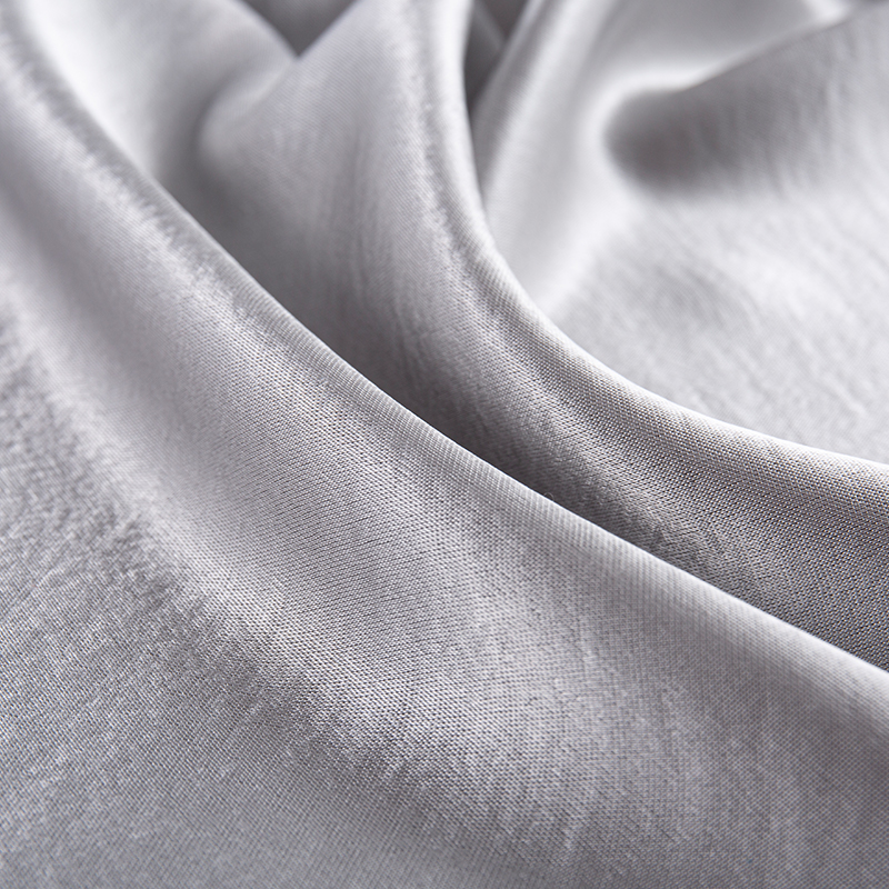 Forgyldt satin stof