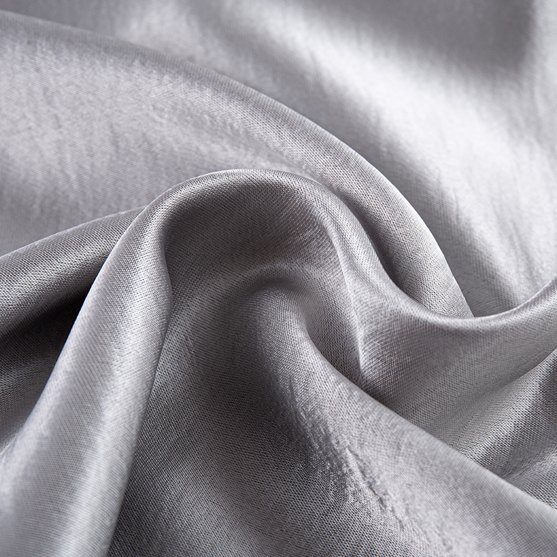 Forgyldt satin stof